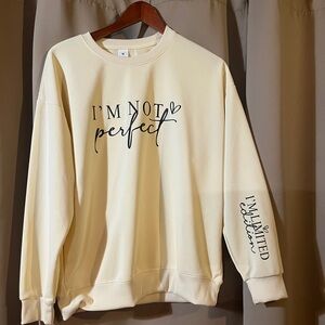 Light yellow light sweatshirt.